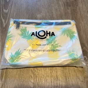 Aloha collection splash proof travel pouch. Never used with tags
